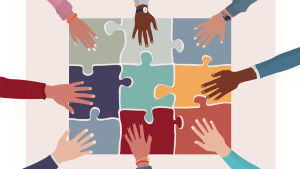 Ett 9-bitars pussel i olika färger. Åtta händer håller på varsin pusselbit.